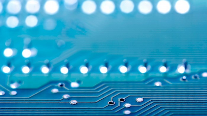 Close-up of a blue circuit board with lights