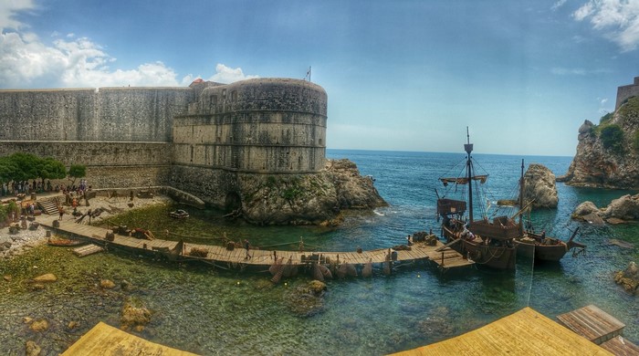 Ship docked at Dubrovnik's ancient city walls