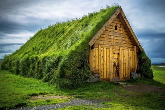 Wooden house with grass roof in Iceland