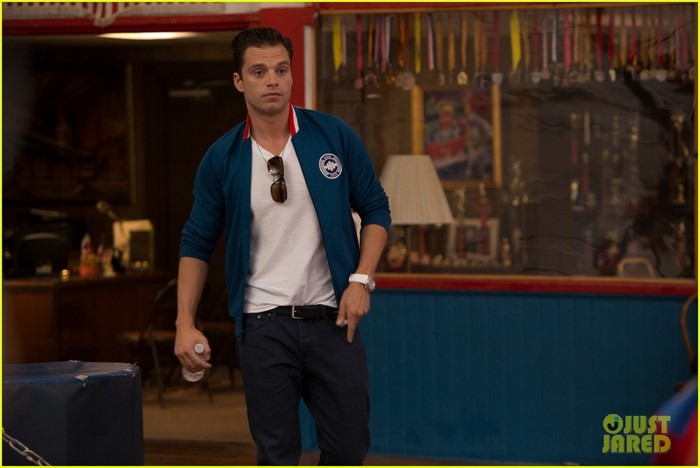 Sebastian Stan in a blue jacket