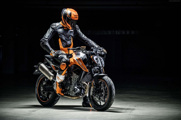 KTM Duke 790 motorcycle with rider in orange and black gear