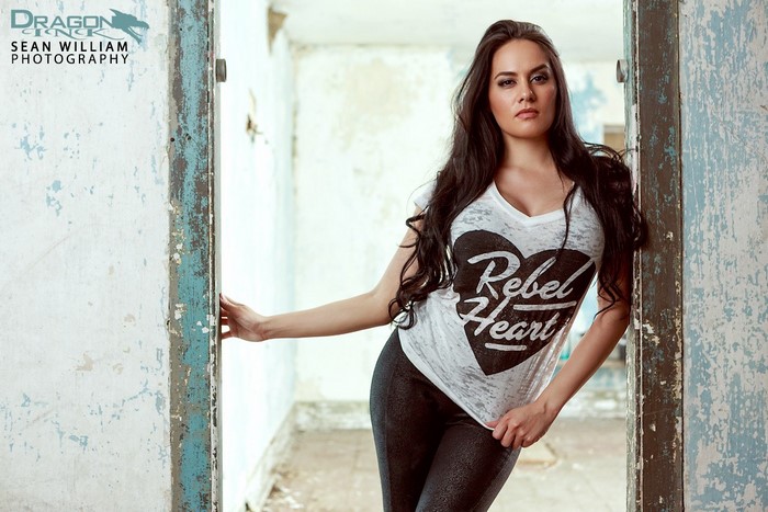 Woman in Rebel Heart T-shirt and leggings