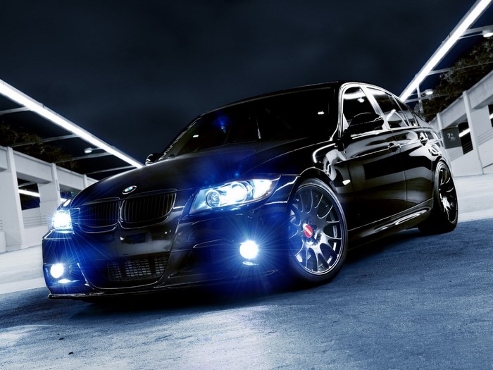 Black BMW 3 Series Sedan with Blue Headlights