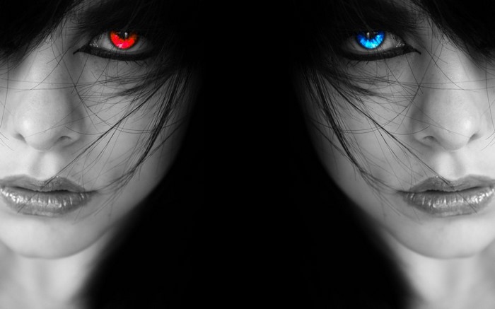 Collage of a woman's face with red and blue eyes