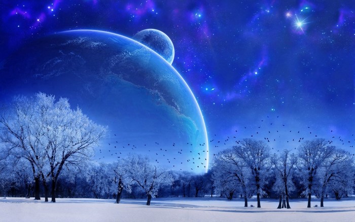 Fantasy planet and moon over snowy trees