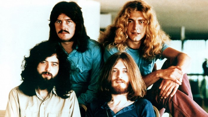 Led Zeppelin band members posing for a photo
