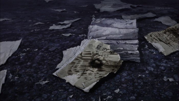 Scattered papers with Japanese text and a drawing on the ground
