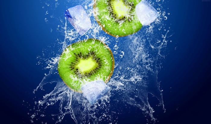 Kiwi slices with ice cubes in water
