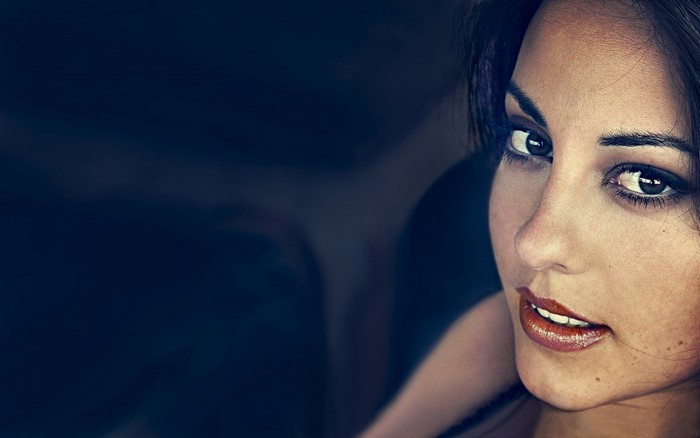 Close up portrait of a woman with dark hair