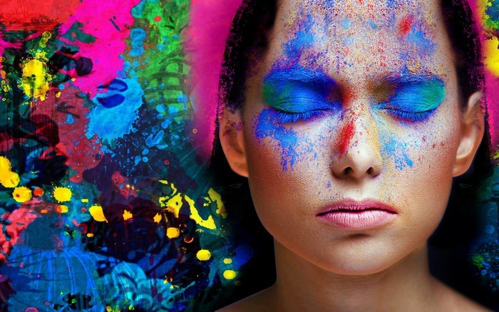 Woman with colorful paint on her face