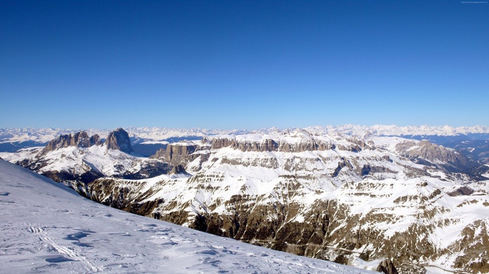 Snowy mountain range with clear blue sky