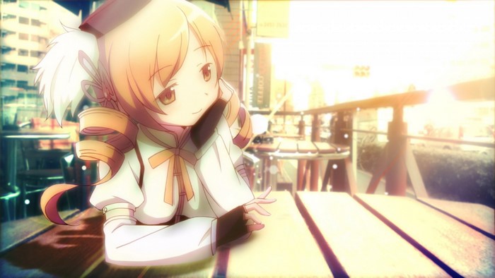Mami Tomoe from Mahou Shoujo Madoka Magica sitting at a table