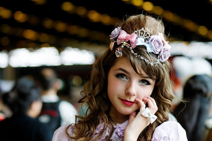 Young woman in lolita fashion with flower crown