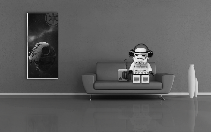 LEGO Stormtrooper listening to music on a couch with Death Star art