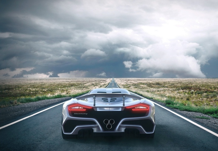 Hennessey Venom F5 driving on a road