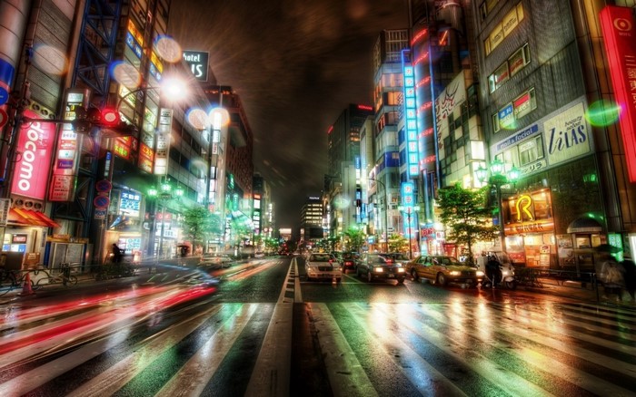 Nighttime Tokyo street with car light trails