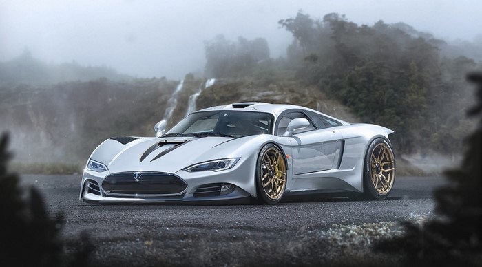 Silver Tesla R45 sports car on a misty road