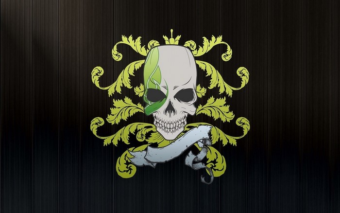 Skull with ornate yellow flourishes and banner