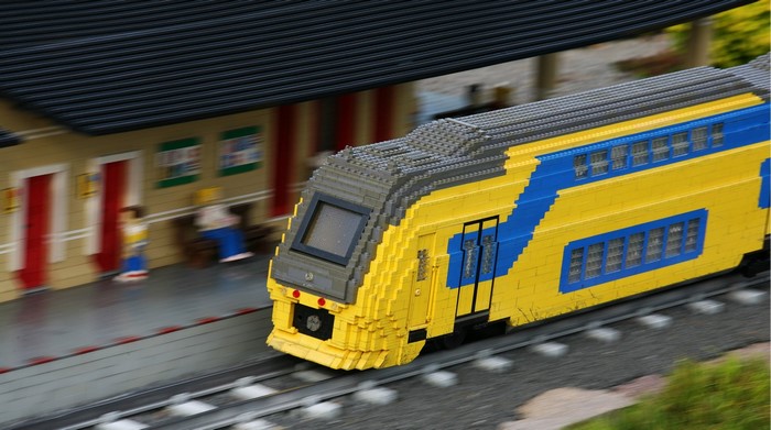 LEGO train at a blurred train station