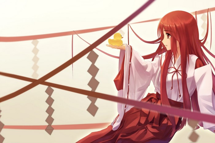 Anime girl with red hair holding a rubber duck