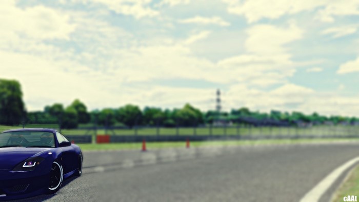 Blue sports car on a race track