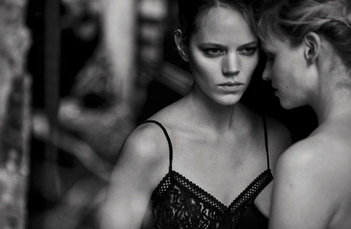 Two women in black lingerie, monochrome portrait
