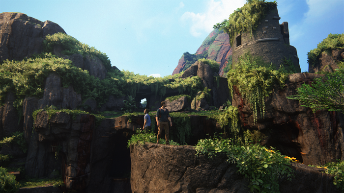 Nathan Drake and companion in Uncharted 4 ruins