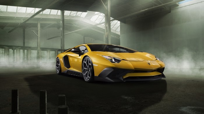 Yellow Lamborghini Aventador in industrial building