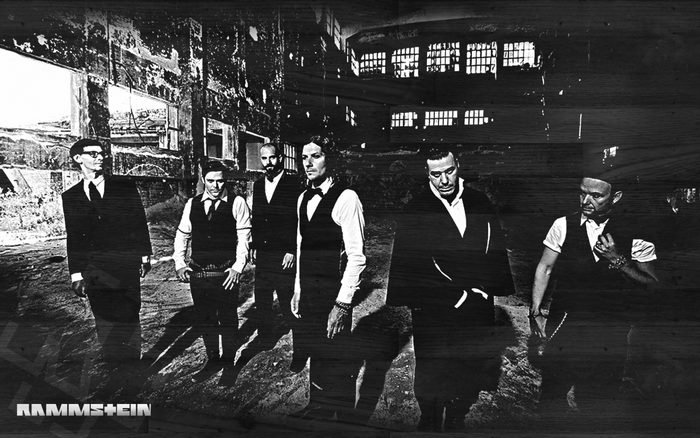 Rammstein band members in monochrome photograph