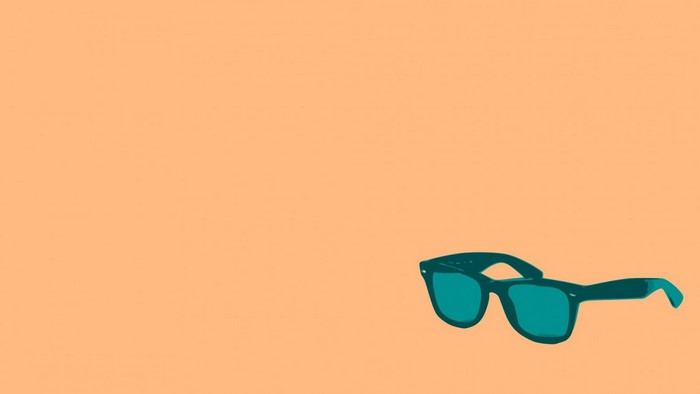 Minimalist illustration of teal sunglasses on an orange background