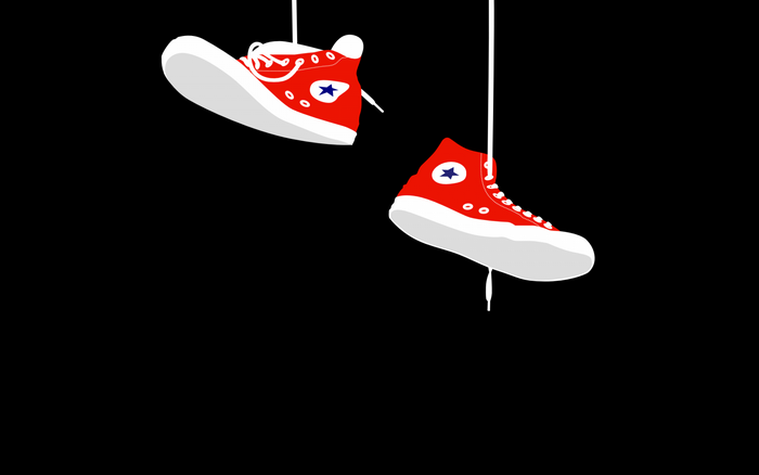 Red Converse Chuck Taylor All-Stars hanging