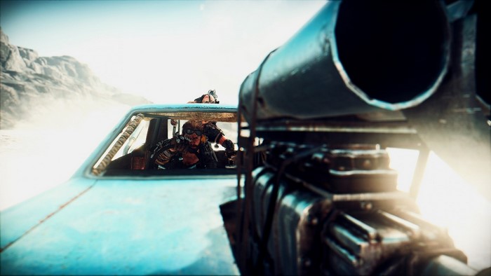 Mad Max game screenshot of a character driving a car