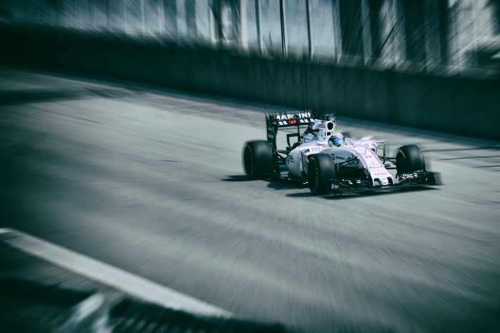 Felipe Massa driving a Formula 1 car on a race track