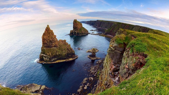 Dramatic sea stacks and cliffs along a rugged coastline