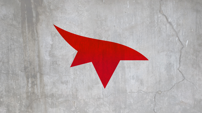 Red abstract shape on a concrete wall