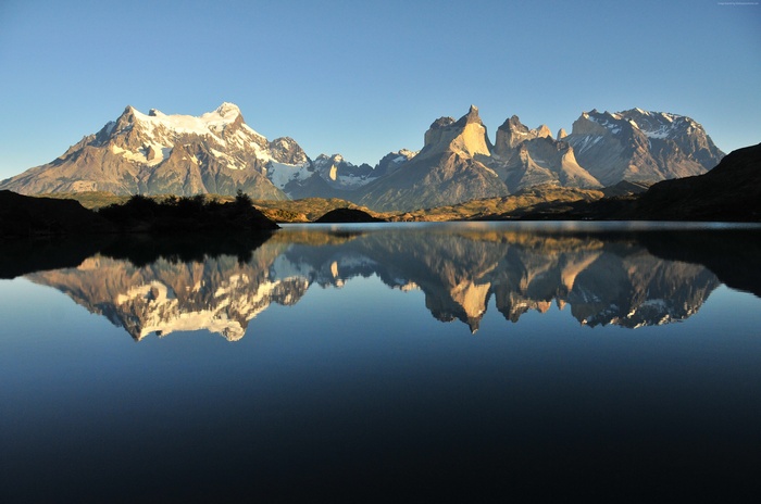Torres del Paine mountains reflected in lake, Chile