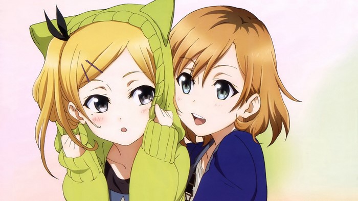 Two anime girls, one in a green hoodie