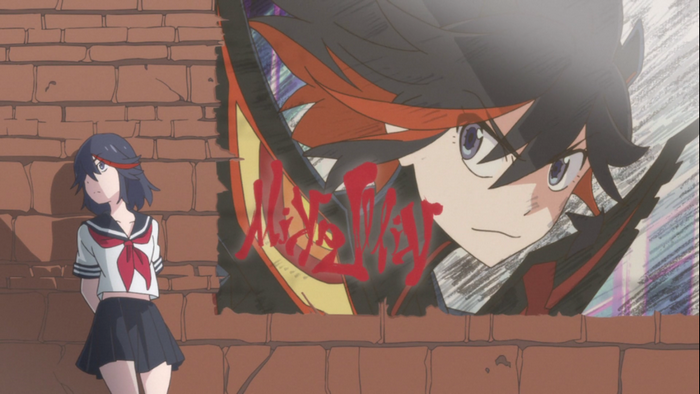 Ryuuko Matoi from Kill la Kill standing by a brick wall with a mural