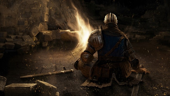 Knight sitting by a bonfire in Dark Souls