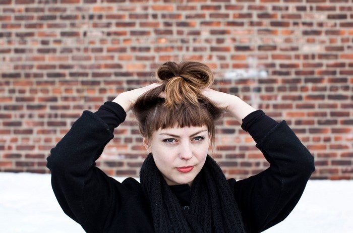 Angel Olsen with hands in her hair