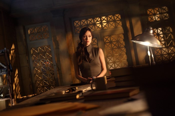 Summer Glau in a dimly lit room
