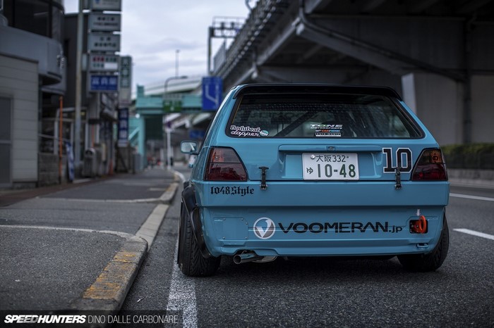 Blue Volkswagen Golf MK2 with Voomeran branding in Japan