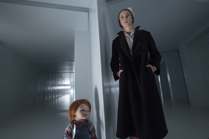 Chucky and a nurse in a hallway