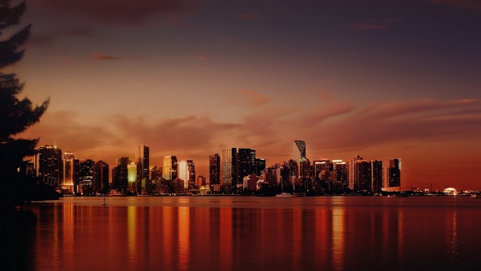 Miami skyline at sunset over the water