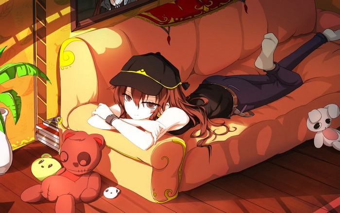 Anime girl with brown hair lying on a couch