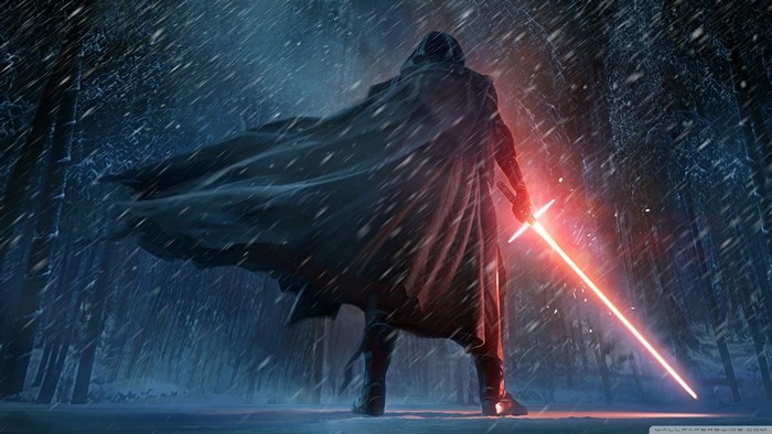 Kylo Ren from Star Wars with a lightsaber in snow