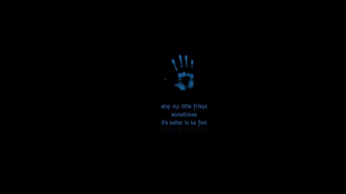 Blue handprint with quote on black background
