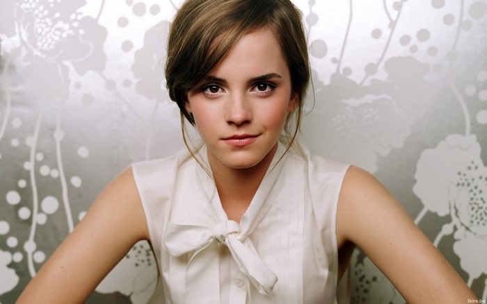 Emma Watson wearing a white blouse