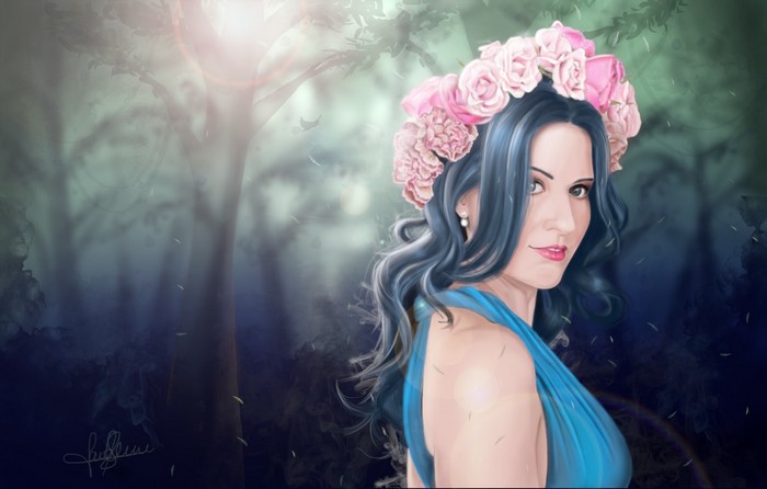 Woman with flower crown in forest