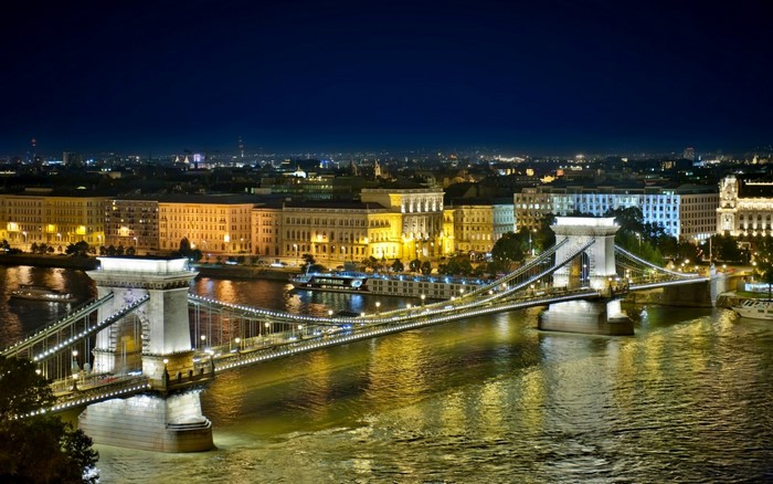Chain Bridge over Danube River at night in Budapest, Hungary